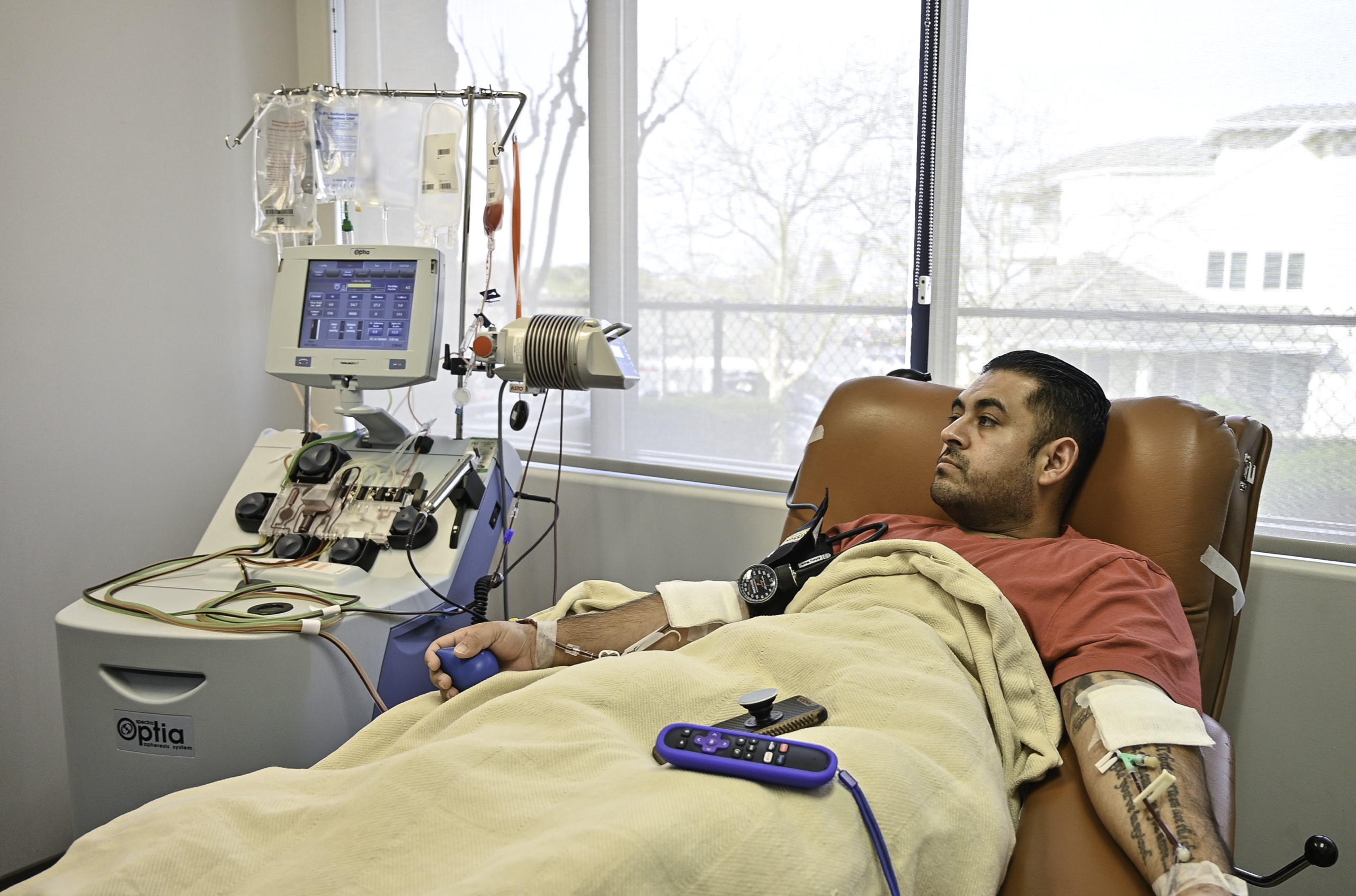 Donor giving blood in our state-of-the-art collection center